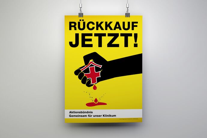 Gelbes Plakat mit rotem Krankenhaus Zeichen das von einer Hand zerquetscht wird_______